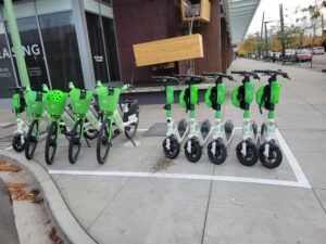 electric scooter in a dockless parking station in kelowna.